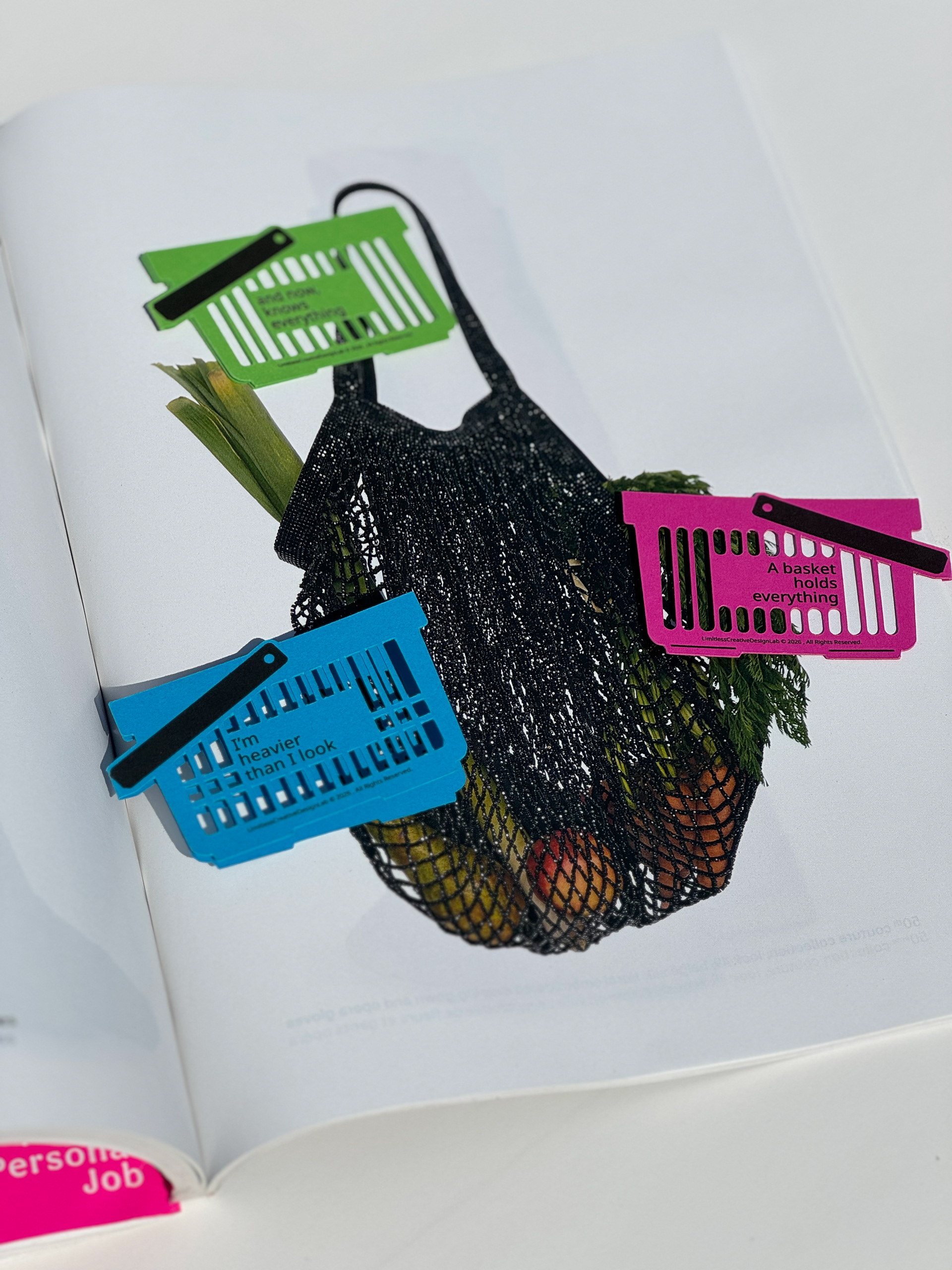 Green, blue and pink shopping-basket bookmarks.