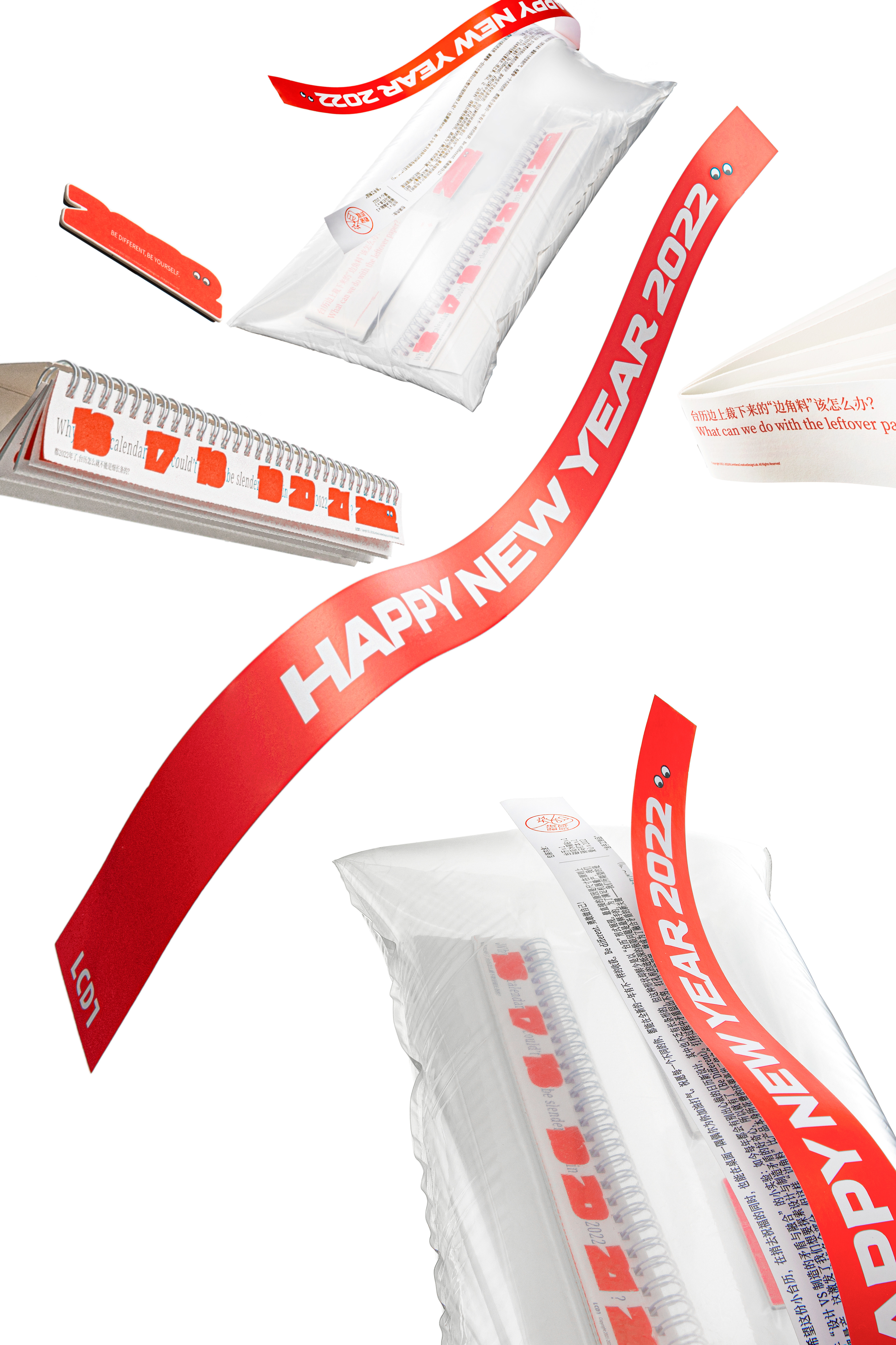 Be Different stationery gifts with red New Year greeting ribbons.