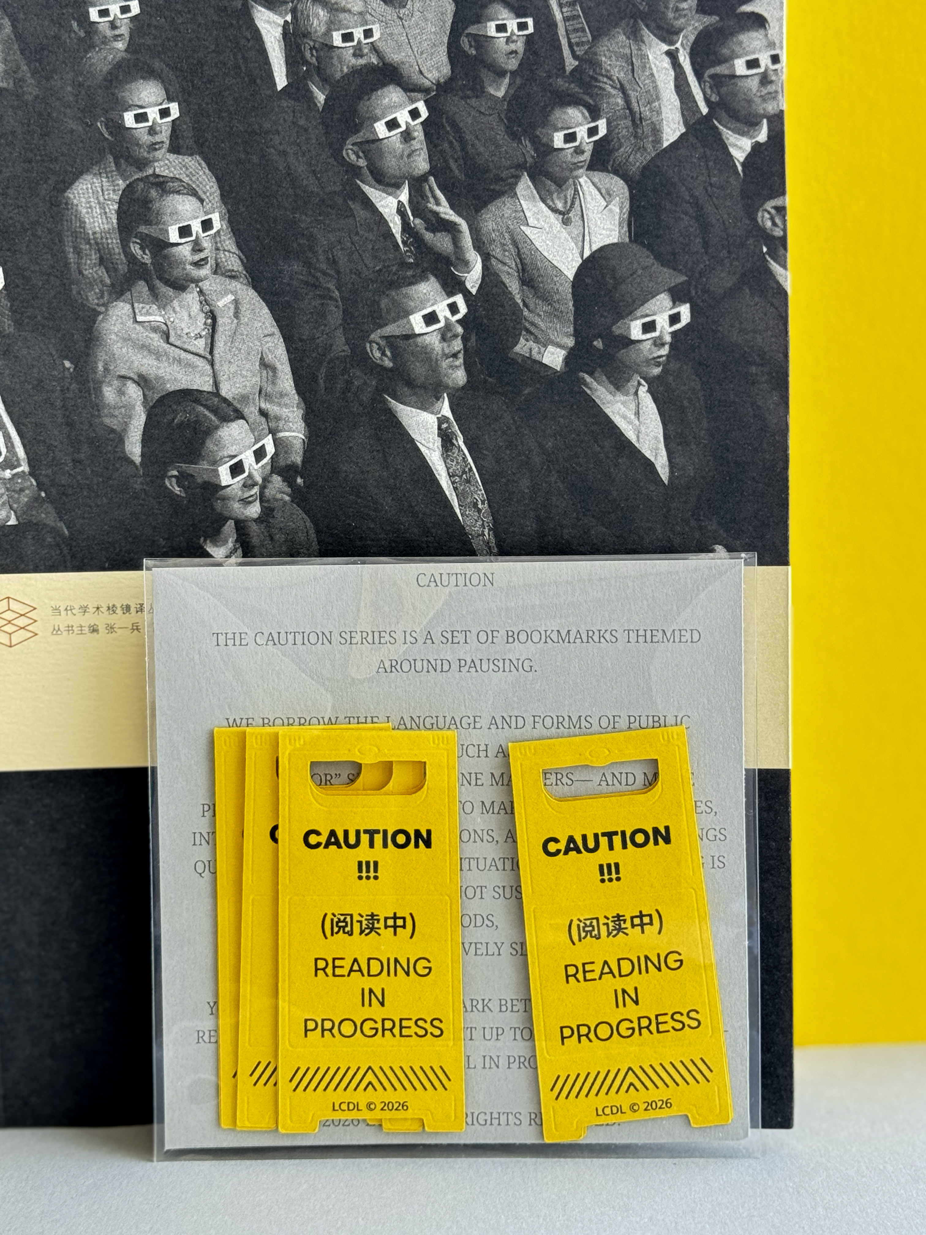 CAUTION bookmark packaging