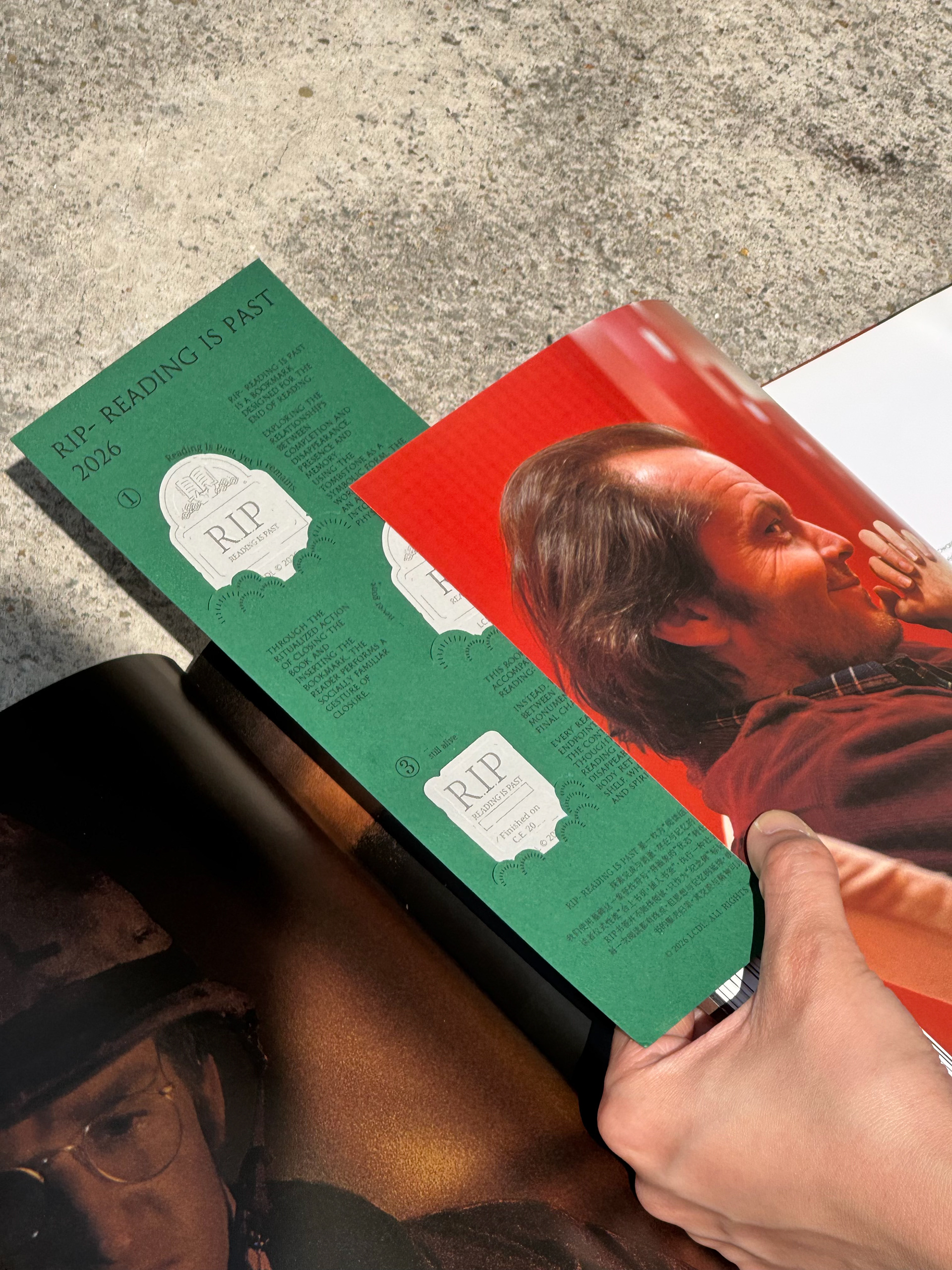 An RIP bookmark with book pages.