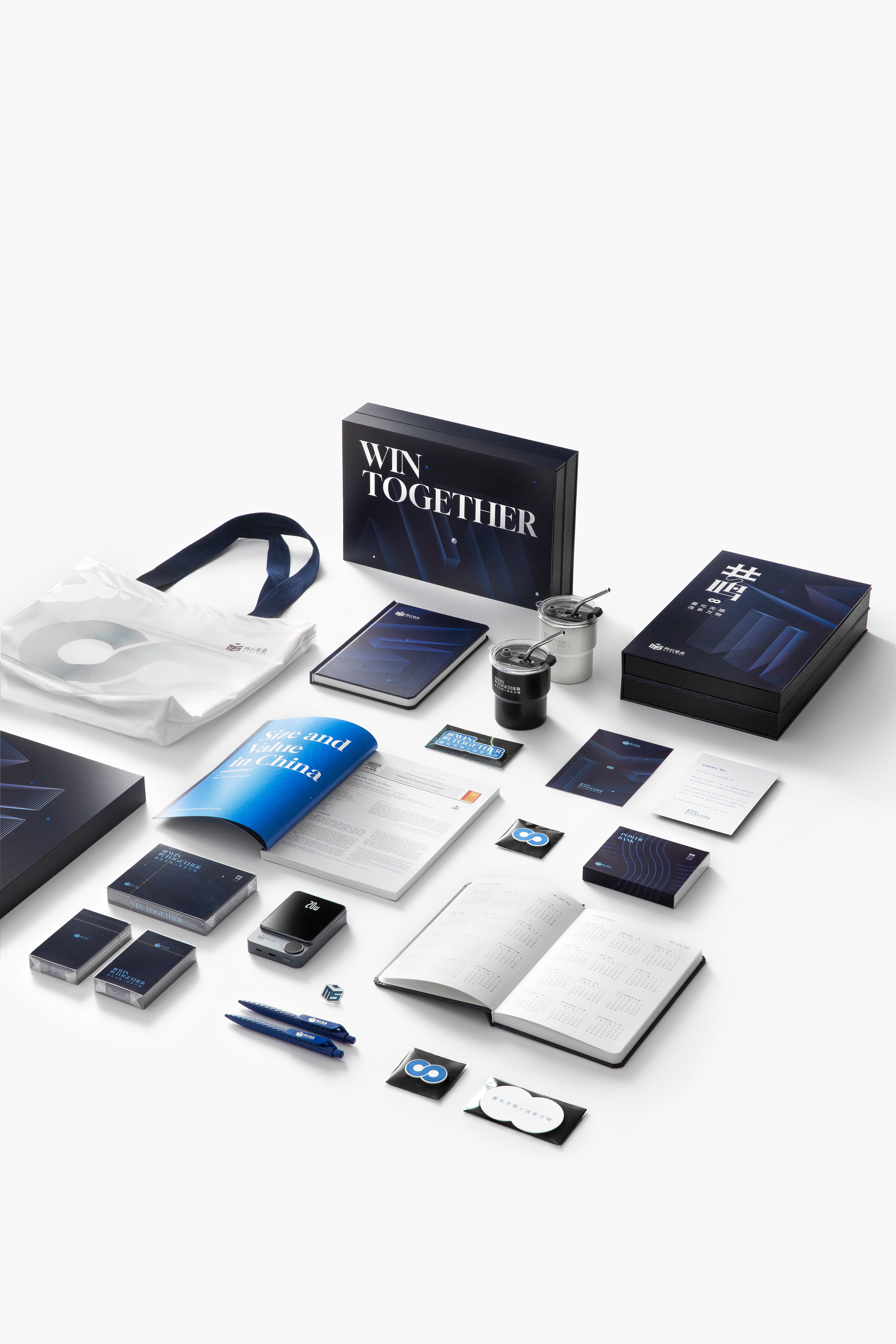 A flat lay of Win Together printed materials and branded items.